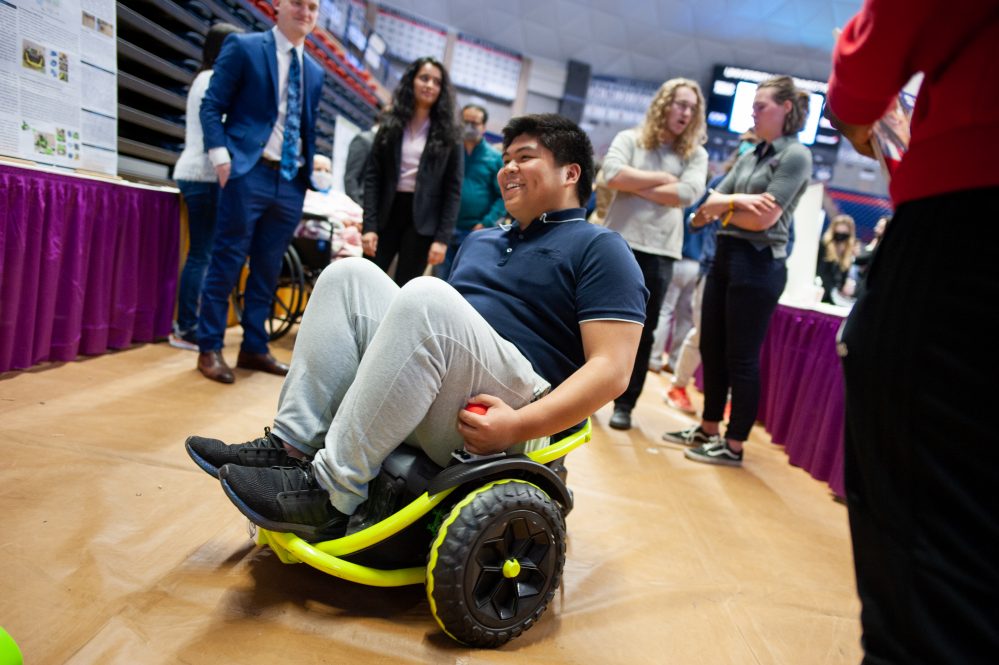 senior design male student in project wheel chair